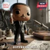 Vinyl figure in a black suit holding a neuralyzer prop on a workbench with workshop tools and Bipu Bunny branding.!