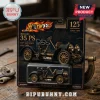 Mercedes 35 PS 125th Anniversary Die-Cast Model Car in black and gold packaging on a wooden surface with metal tools.