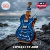 Metallica Ride the Lightning themed electric guitar shaped whiskey bottle with cork stopper on a dark rocky coast.!