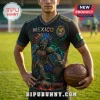Black Mexico soccer jersey featuring an Aztec skull warrior graphic, Mexico text, and national crest on a green field.!