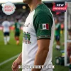 White soccer jersey featuring Mexico flag patch, green sleeves with Aztec patterns, and a graphic of standing players.!