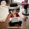 Michael Jackson crochet doll wearing a fedora and red jacket, holding a sign with You are not alone lyrics.!
