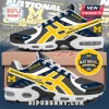 Michigan Wolverines 2026 NCAA basketball champion sneakers with blue, yellow, and grey fabric and white air-cushion soles.!