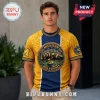 Man wearing Michigan Wolverines gold and blue graphic t-shirt with embossed stadium and wolverine mascot logo design.!