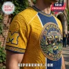 Michigan Wolverines yellow and blue textured jersey with an illustrated wolverine emblem, football helmet, and stadium.!