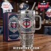 Minnesota Twins Yeti tumbler with ornate silver filigree, embedded jewels, TC logo, and Target Field imagery on a table.!