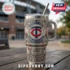 Minnesota Twins Yeti tumbler with metallic engraved filigree, rhinestone accents, and Target Field imagery on a table.!