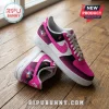 Custom Toronto Blue Jays sneakers in pink and black with breast cancer awareness ribbons on a wooden floor.!