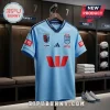 NSW Blues light blue rugby jersey with Ampol, GIO, and Westpac logos hanging in a locker room setting.!