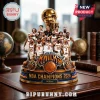 New York Knicks 2026 NBA Champions trophy figurine with team roster and gold basketball on a blue and bronze circular base.!