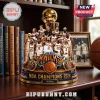 New York Knicks 2026 NBA Champions trophy figurine with team roster figures, blue and orange accents, on a wooden desk.!