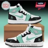 Custom high-top sneakers in white, black, and mint green with Air Jordan branding and New York Liberty logo on heel.!