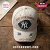 New York Yankees 1903-2026 distressed beige baseball cap with frayed edges and navy blue pinstripe logo patch.