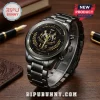 Newcastle United stainless steel wristwatch with black finish, gold logo, 135 years text, and metallic link band.!
