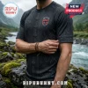 Black athletic shirt with Norse patterns, Thor hammer icons, Norway flag patch, and 2026 text against a fjord background.!