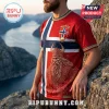 Man wearing a red Norwegian flag t-shirt featuring a Viking warrior illustration and intricate gold Norse patterns.!