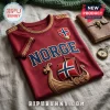Maroon Norwegian soccer jersey with gold braided trim, Norway flag shield, Norge text, and a Viking ship graphic design.!