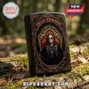 Black metal lighter with Ozzy Osbourne graphic, ornate gold frame, and text reading Rock Legend 1948-2025 on mossy log.!