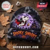 Peanuts Spooky Snoopy Tie-Dye Halloween Beanie Hat featuring a vampire Snoopy illustration over a purple moon backdrop.