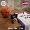 Philadelphia 76ers LeBron James Championship Ring in a wooden display box next to a basketball and team jersey.