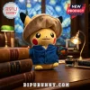 Pikachu plush wearing a tan straw hat and blue shirt holding a small artist palette in a study with books and an inkwell.!