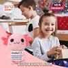 Pink crocheted axolotl plush holding a white sign reading Positive with an axolotl icon and encouraging text.!