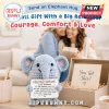 Light blue crocheted elephant plush holding a card with positive affirmation text next to an open beige gift box.!