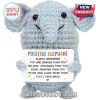 Light blue crocheted elephant plush holding a white sign with motivational text about bravery, strength, and love.!
