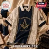 Navy and cream Freemason polo shirt with embroidered square, compass, G, and pillar motifs. Text reads 1717 and Freemason.!