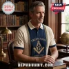 Man wearing a navy and cream polo shirt with Masonic Square and Compasses emblem and the text Freemason Since 1717.!
