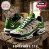John Deere branded sneakers in green, white, and gold, featuring the Nothing Runs Like A Deere slogan on a wooden bench.!