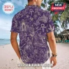 Prince Purple Toile Short Sleeve Button Down Shirt featuring imagery of Prince, guitars, doves, and symbols on purple fabric.