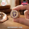 Gold championship-style ring featuring the Prince logo, Purple Rain text, and small purple stones held by fingers.!