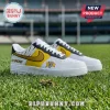 Richmond Tigers themed leather sneakers in yellow, black, and white with tiger logo on grass stadium field background.!