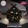 Black backpack featuring a pattern of gold circular coins with R symbols and small red, blue, and green geometric blocks.!