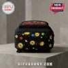 Black Roblox backpack with character graphics and gold Robux coin print, sitting on a concrete surface.!