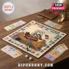Route 66 100th anniversary board game on wooden table with metal tokens, paper currency, and two white dice.!