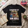 Black cotton t-shirt featuring a Jurassic Park graphic, Sam Neill portraits, dinosaur images, and 1947-2026 text.!