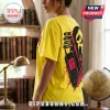 Bright yellow t-shirt featuring a Ghostface horror movie graphic, a telephone, and the text One Call Changes Everything.!