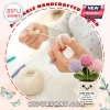 Hands crocheting a small potted tulip amigurumi with a sign reading Love You Sis, A sister is God's way.!