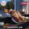 Orange and purple Halloween sneakers featuring Snoopy as a mummy and witch on white soles with a jack-o-lantern theme.!