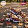 Snoopy Halloween sneakers with orange and purple print, featuring Mummy Snoopy on a broomstick and jack-o'-lanterns.!
