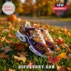 Orange and purple Halloween themed sneakers featuring cartoon Snoopy designs, pumpkins, ghosts, and white air-cushioned soles.!