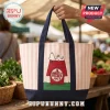 Canvas tote bag with pink stripes, navy straps, and Snoopy on a Trader Joe's red doghouse illustration.!