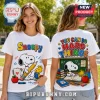 White t-shirt showing front and back prints of Snoopy and Woodstock in a classroom with the text You Can Do Hard Things.!