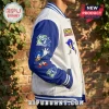 White and blue varsity jacket featuring Sonic the Hedgehog graphics and 35th Anniversary patches on a brick wall background.!