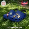 Blue foam clogs featuring Sonic the Hedgehog character charms displayed on green grass.!