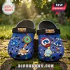 Blue Sonic the Hedgehog foam clogs with character charms, featuring Tails and Chao on a brick garden pathway.!