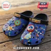 Blue foam clogs featuring Sonic the Hedgehog graphics, character charms, and Sonic Anniversary strap branding.!