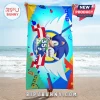 Sonic the Hedgehog 35th Anniversary beach towel with blue gradient background, red ribbon, and geometric graphic accents.!